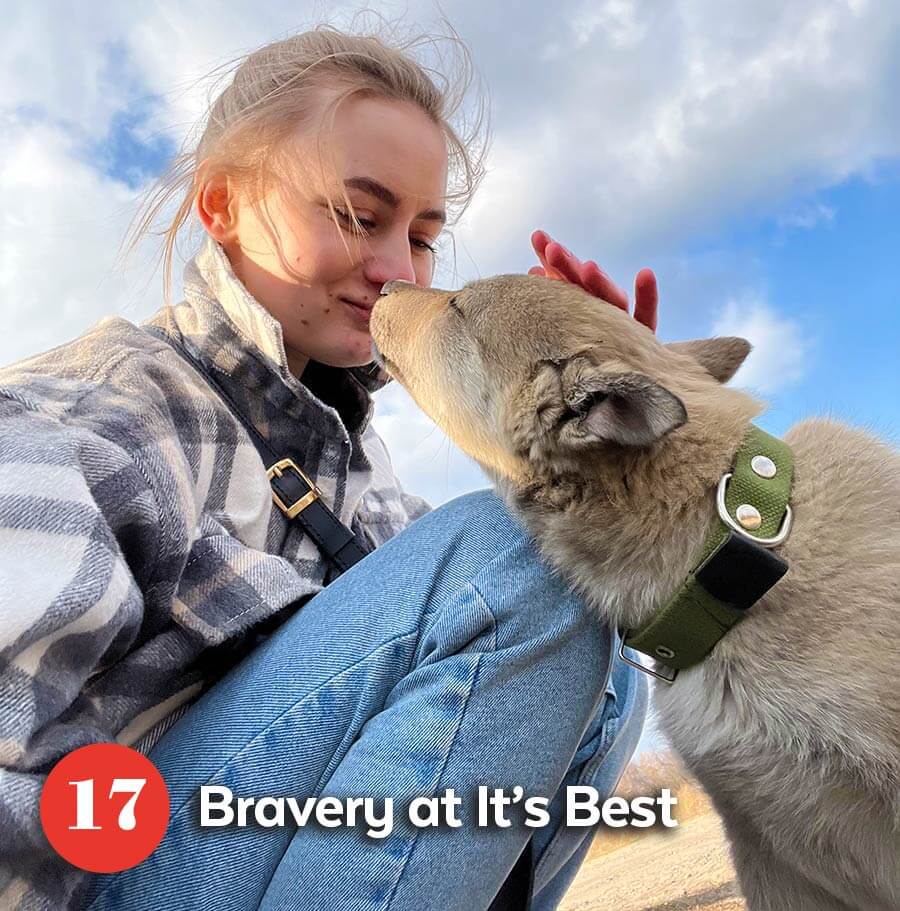 Rescuer kissing the rescue dog in Ukrain