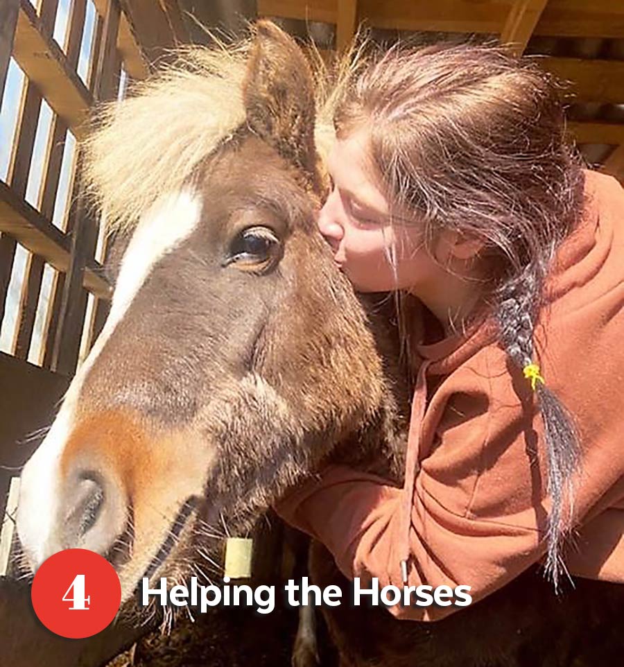 A rescuer kissing her horse