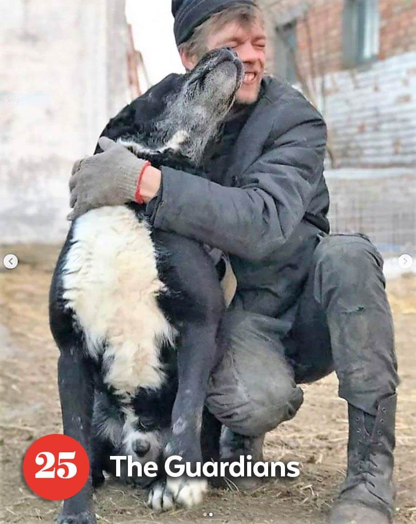 Ukrainian rescuer huggin dog