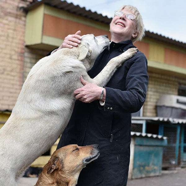 Ukraine rescuer and her rescued dogs